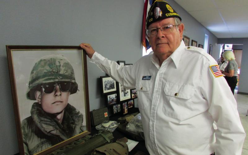 Vietnam Vet Jim James shows some of the memorabilia he acquired on his tour during the Vietnam War. Photo by DeAnna Maddox