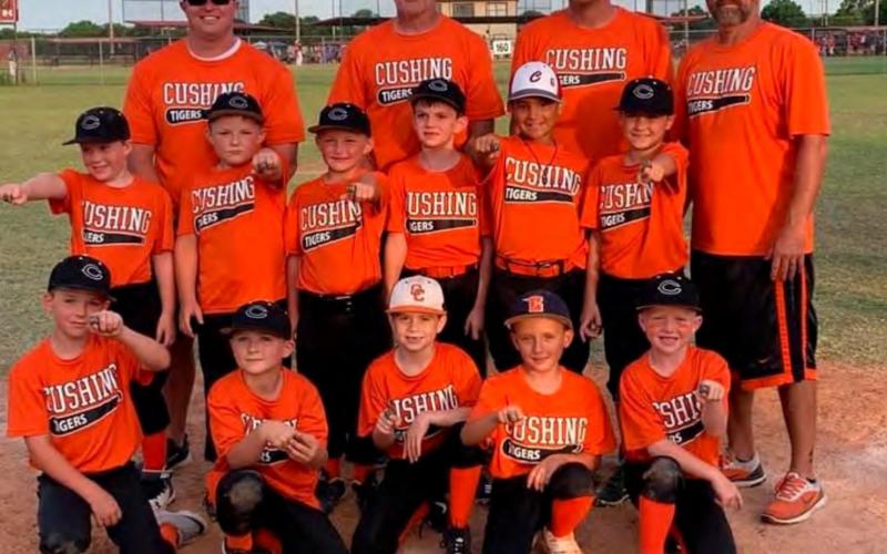 The 7U Tigers show off their championship rings from the Blanchard Tournament this weekend. They are, bottom row from left, Tate Hancock, Tyler Harrison, Eli Dennis, Lyndon Casarez and Wes Nickell. Second row from left Lucas Vieyra, Jackson House, Jacob House, Bo Hightower, Dillon Mann and Ford Turner. Back row from left, coaches Dusty Hancock, Brian Hightower, Matt Turner and Rennie Nickell.