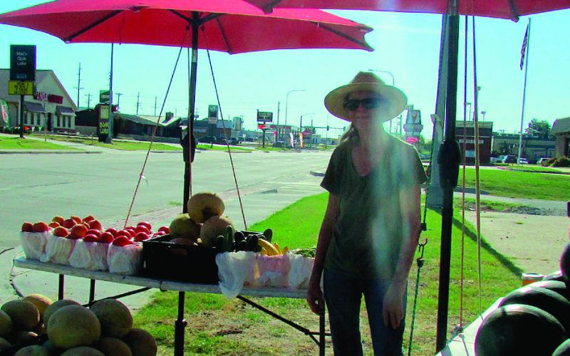 Donna Wilson spends most Wednesdays and Fridays selling fresh fruits and vegetables and raw honey on Main Street in Cushing or around Chandler. Her son and her rotate locations of the stands they set up with produce prices up to $30. Be sure you have cash if you stop in — they are not currently able to process any type of card payments.