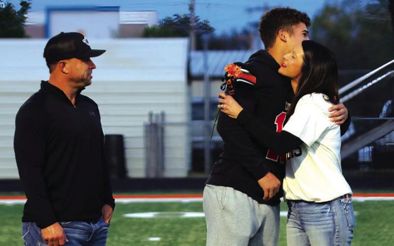 Football Player Brock Bales, the son of Curtis and Dusty Bales; a teacher who has impacted Brock is his mom, Mrs. Bales.