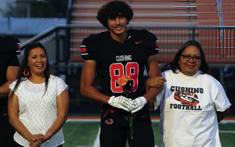 Football Player Isaac Denny, the son of Genia (Gina) Denney and the grandson of Everett and Melissa Denny; a teacher who has impacted Isaac is Coach Barry Patterson.