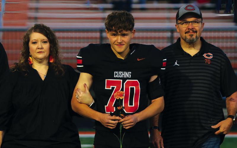 Football Player Nate Handy, the son of Chad and Kelly Handy; a teacher who has impacted Nate is Mrs. Moore.