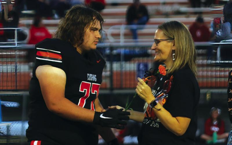 Football Player Logan Owings, the son of Becky Owings; a teacher who has impacted Logan is Mr. Roscoe Neal.