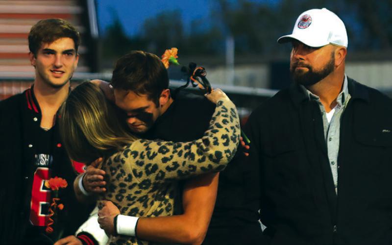 Football Player Lane Wood, the son of JR and Rachel Wood; a teacher who has impacted Lane is Mrs. Coach Rockwell