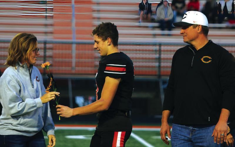 Football Player Wyatt DeLong, the son of Justin and Amber DeLong; a teacher who has impacted Wyatt is Coach Douthit.