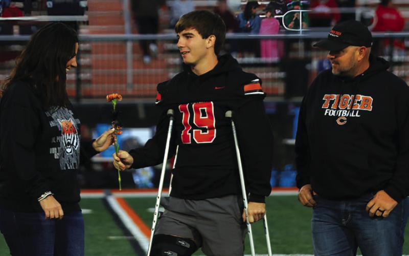 Football Player Tucker Lang, the son of Heath and Cheyanne Lang; a teacher who has impacted Tucker is Coach Guerrero.