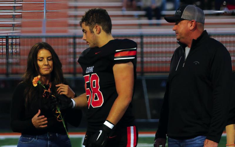 Football Player Bret Griffeth, the son of Jason Griffeth and Amber Griffeth; a teacher who has impacted Bret is Coach Jared Kennedy.
