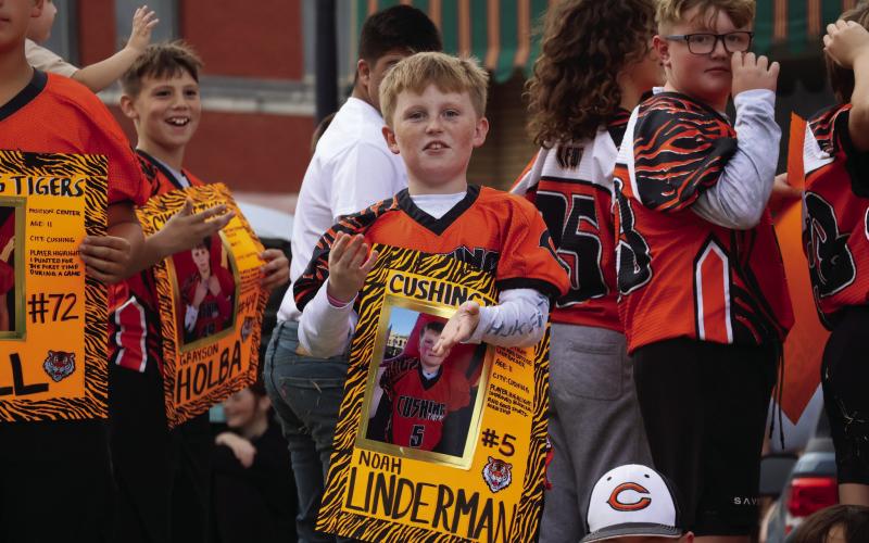 CUE football player Noah Linderman shows off his Tiger Spirit during the Homecoming Parade.
