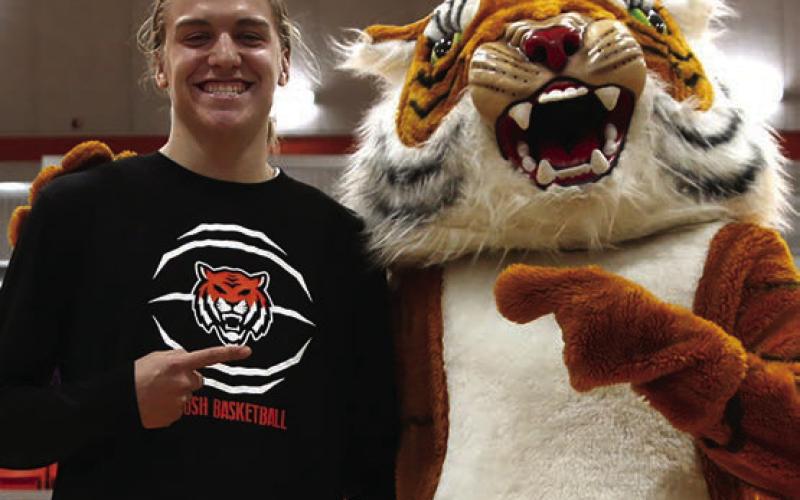 Jasper Skelnik and Tony the Tiger smile for the camera. Photos by Amber Fausto.