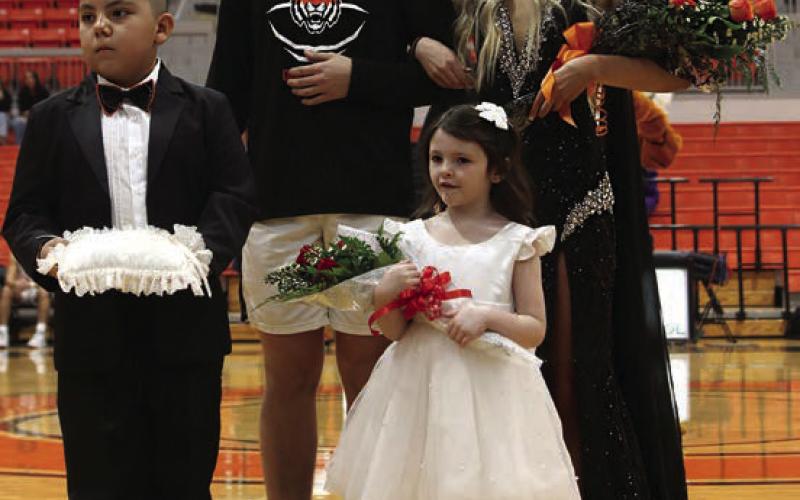 Cushing Basketball Homecoming Royalty pose for a picture after the coronation ceremony held Friday, Jan. 26. Pictured are King Johnny Hilligoss, Queen Kaitlynn Callanan, Prince Jensen Tipps, and Princess Finley Hagen.
