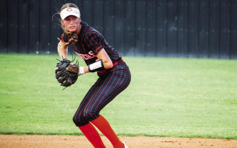 Shortstop Harley York winds up to fire another scoop to first base as the Lady Tigers upset Tuttle 3-2. Photo by Dallas Lauderdale