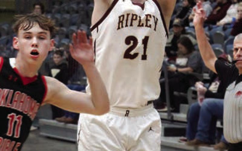 JW Lesko takes the three-point shot over the closing-out OBA defender.