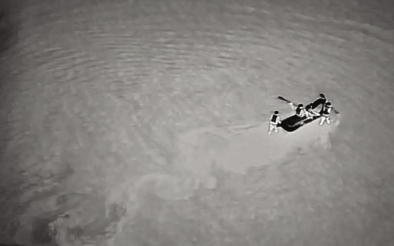 Drone view of water rescue team deploying from the East bank of the Cimarron River to pick up Cullum after impact. Photo courtesy of Olive Volunteer Fire Department.