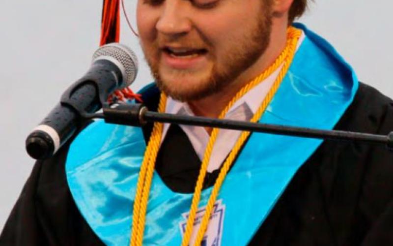 Valedictorian Jonathan Huseman delivers his address, telling his fellow students that to get ahead in life they need to work both smarter, and harder.