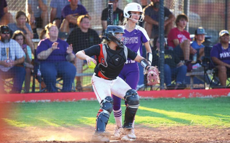 Top: Madison Alexander was a force to be reckoned with at the plate last week, but it was her clutch single to center field that drove in the winning run to defeat the Pirates of Bristow Thursday.