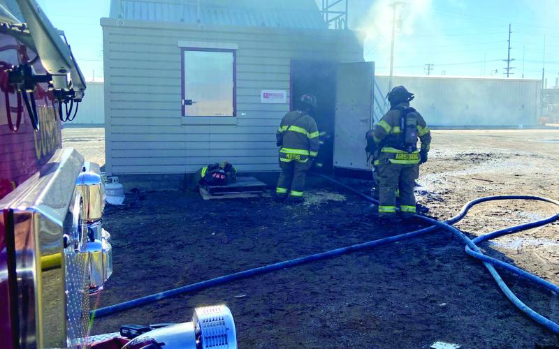 Cushing firefighters Tyler Morris and Dalton Armstrong participate in a recent in-service day where members of the department were trained on how to utilize the newly-christened fire training tower. Then tower was manufactured by Fire Facilities, Inc.
