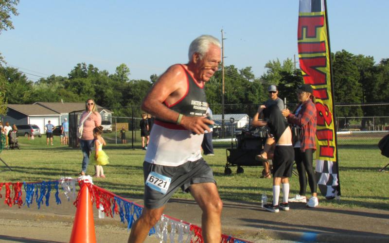 Tyson Branyan — Cushing Rotarian, city commissioner, and Grappler’s Gallop 5K participant crosses the finish line last Saturday, Sept. 30.