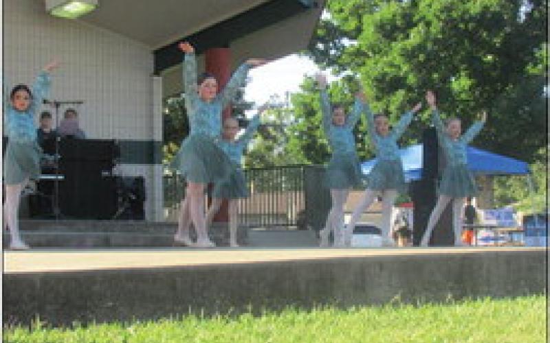 The young ballet group from Dance Star Productions plie’ their way across the stage as one of the groups to preform during Festival in the Park