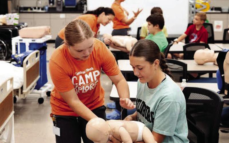 Central Tech Camp Explorer campers practiced CPR and Heimlich on infantsized mannequins.
