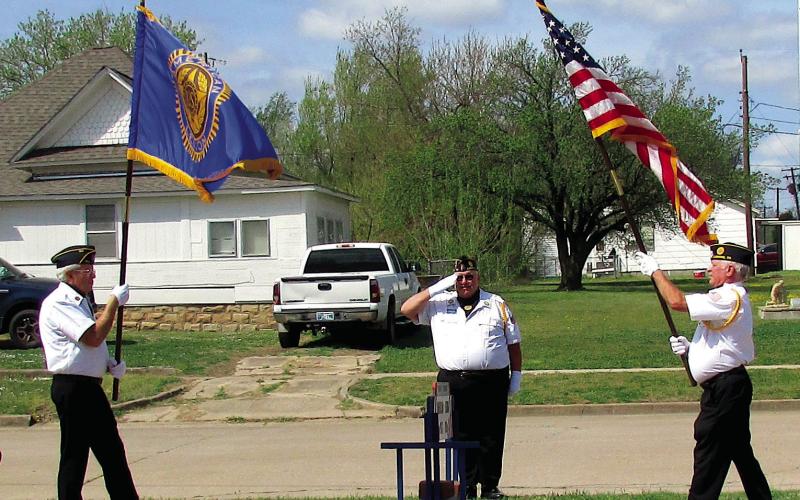 The color guard posted the American Legion and United States flag side by side at the commencement of the commemoration event that was hosted by Post 108 this past Saturday on March 29. Photo by DeAnna Maddox