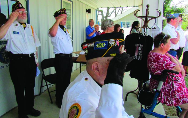 Veterans saluted and citizens placed their hands to their hearts in respect as the colors were presented and Taps played. Photos by DeAnna Maddox