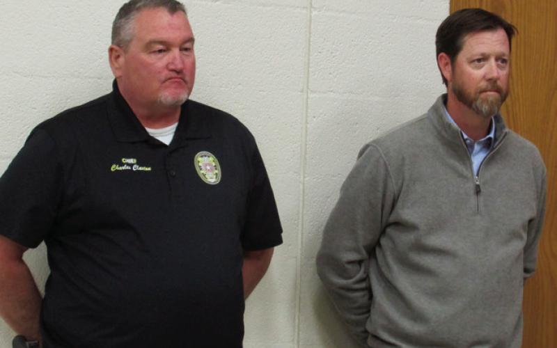 Chuck Claxton and Derek Griffith stand to be recognized. Photo by DeAnna Maddox
