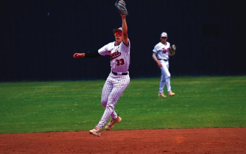 Wyatt Delong makes a leaping catch and steals a hit from a Bristow batter. Photo by Allie Prater