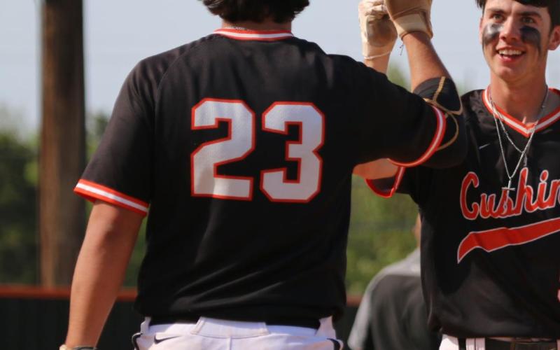 Bryson Walker and Brody Berlowitz celebrate another run.