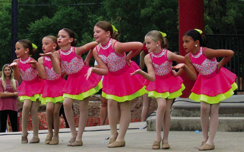 Members of Dance Star Productions took to the stage during Festival in the Park on Saturday, Sept. 24. Pictured is the Mini 2 group preforming a dance to The Jackson 5’s song “ABC” — Ellie Williams, Lakyn Simson, Brynlee Hubbard, Lexi Hatfield, Madison Kelly, and Collins Chavez end the song in style. Photo By DeAnna Maddox