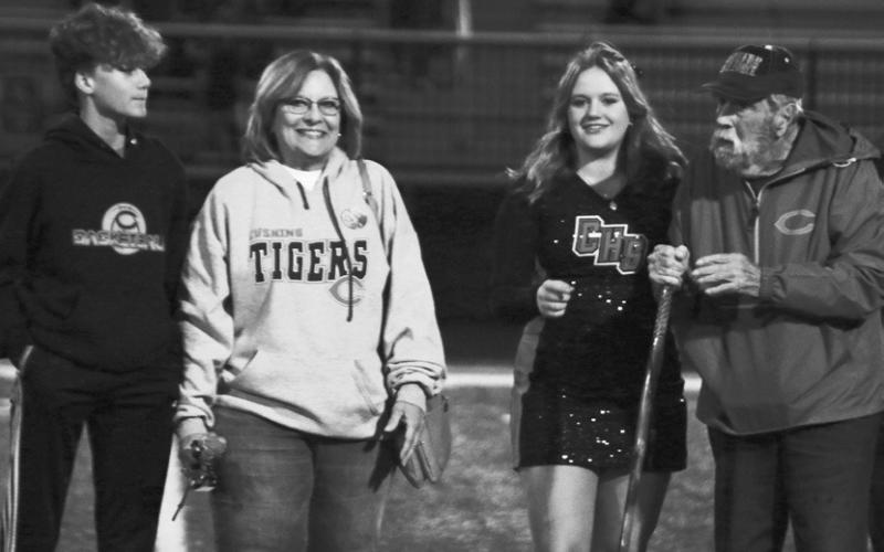 Dance Team Member Julia Kendrick, the daughter of Ed and Karen Fowler and also escorted by uncle Josh Briggeman