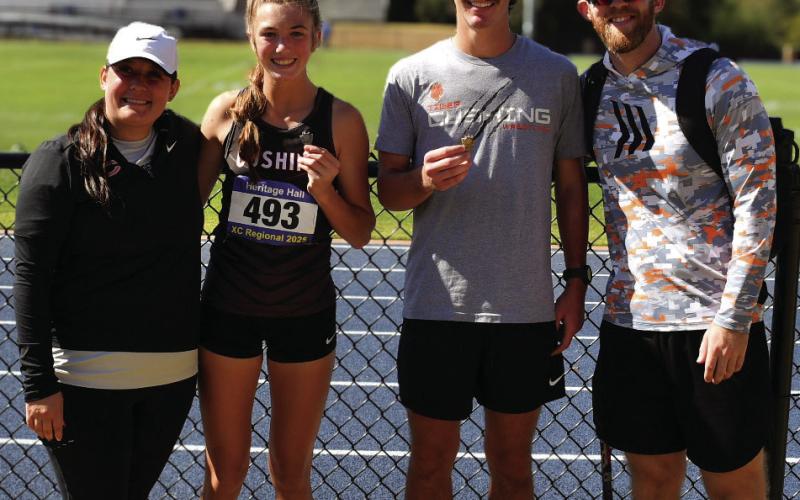 Camden Evans and Harli York hit good enough times at the regional cross country meet to qualify individually for the state championships this weekend. Photo by Sarah Townes