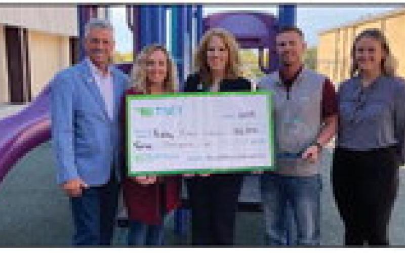 Rep. John Talley, Ripley Elementary School Principal Kerri Brewer, TSET Executive Director Julie Bisbee, Ripley Public Schools Superintendent Kaleb Hoffman and Health Living Program Assistant Coordinator Shelby Keller display a $12,000 check Ripley Public Schools received from TSET recently.