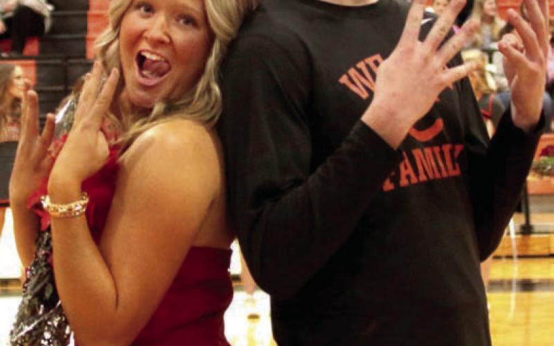 Lane Yaunt escorts Kathryn Jones.