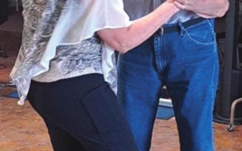Robert Crook and Debbie Brown, cut a rug.