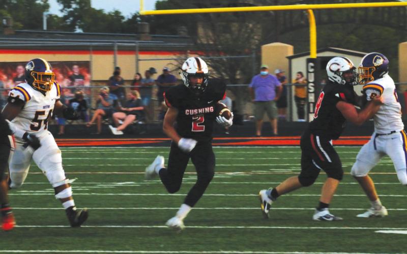 Sophomore Lane Yaunt finds a sizable seam in the Pirate defense.