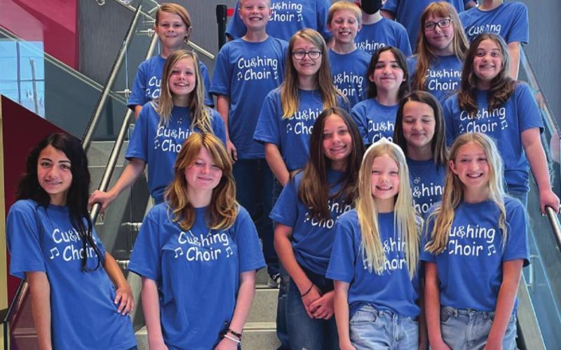 The sixth grade choir students inside the Mustang school during their recent May 5 competition. They received superiors from the judges and went on to be awarded an outstanding achievement plaque.