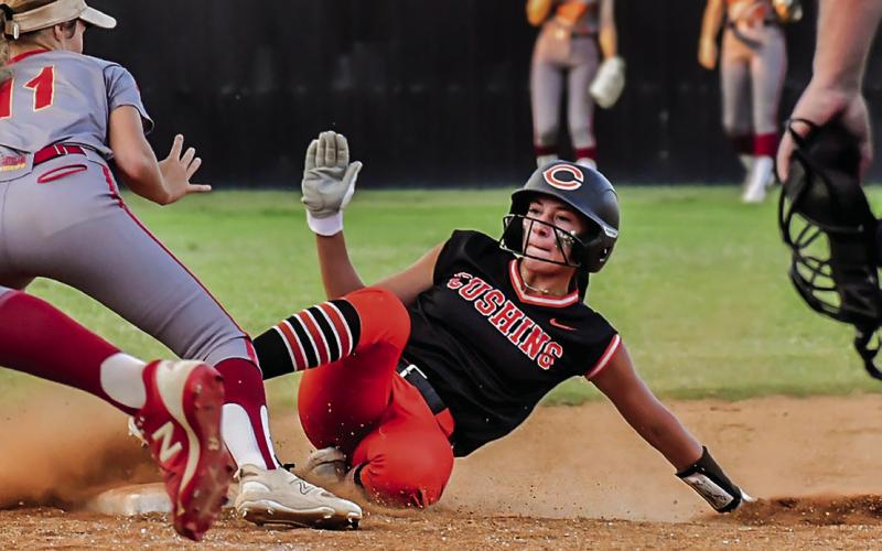 Freshman Matti Terrell makes a textbook slide into third base during the Lady Tigers run-rule win over the Cleveland Lady Tigers last week. Photo by Sarah Townes