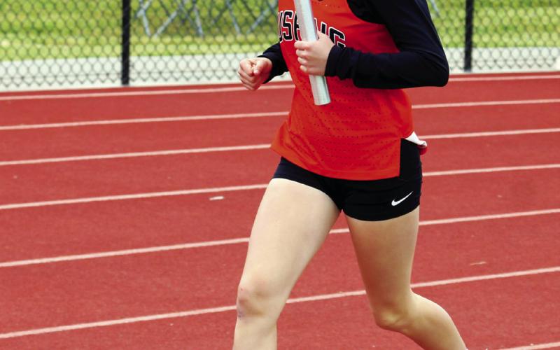 Romy Withiam sprints toward the finish. Withiam competed in the 4x200, 4x400 and 4x800 meter relays.