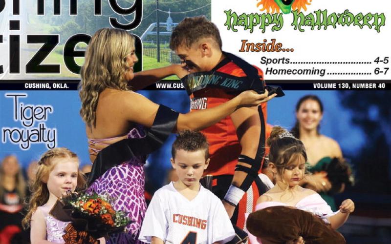 Homecoming queen Gracyn Presley assists King Kellen Fry adjust his unruly sash after they were selected during last Thursday’s homecoming festivities. More photos, page 6. Photo by Cindy Wayland