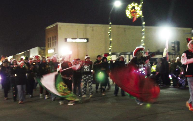 Cushing High School band members made their way down Broadway Street for the Cushing Chamber Christmas parade and for braving the cold the group earned 1st place in the walking category.
