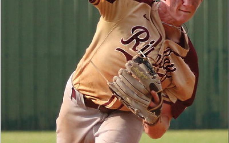 Ripley Warrior Caden Hood winds up from the mound at the OSSAA Class-A district tournament game against the Glencoe Panthers. The Warriors beat Glencoe 11-0.