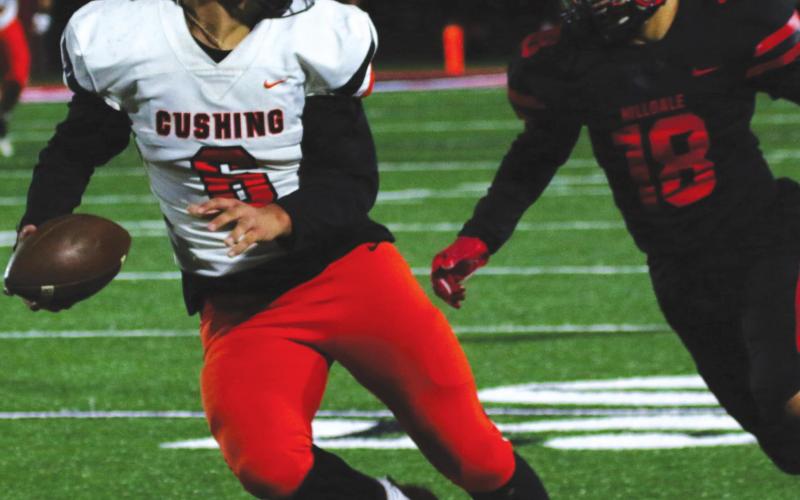 Brody Berlowitz breaks away after catching a pass from his brother Blaze, completing a 71-yard touchdown play to give the Tigers the margin they needed to get a W Friday against Hilldale.