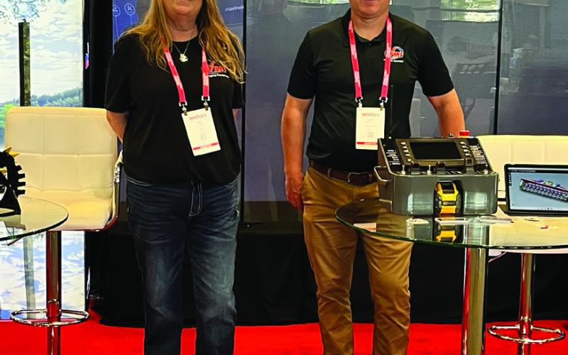 VMI Dredges Graphic Artist AK Chastain Jones and VMI Dredges President Cash Maitlan attend the IMX Inland Marine Expo in Nashville, Tennessee.