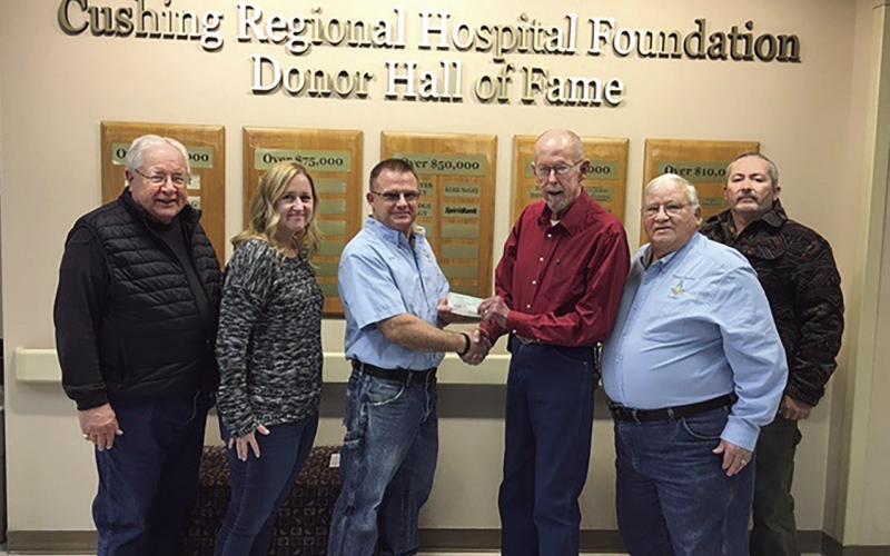 Lee Roy Kalka receives a $1,000 check from Cushing Masonic Lodge's Worshipful Master Sean Martin to be presented to the United Way of Payne County. Kalka's donation was matched with funds from the local Masons to benefit a multitude of county-wide programs. Pictured (from left) are: Joe Manning, Latina Simmons, Sean Martin, Lee Roy Kalka, Mike Harris and Justin Stewart.
