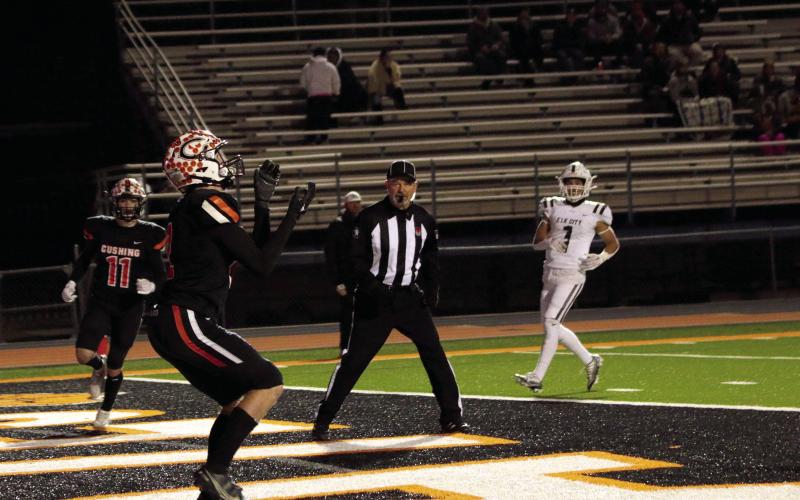 Tight End Lane Yaunt catches a lob from quarterback Blaze Berlowitz after the Tigers perfectly executed a trick play following a Cushing interception.