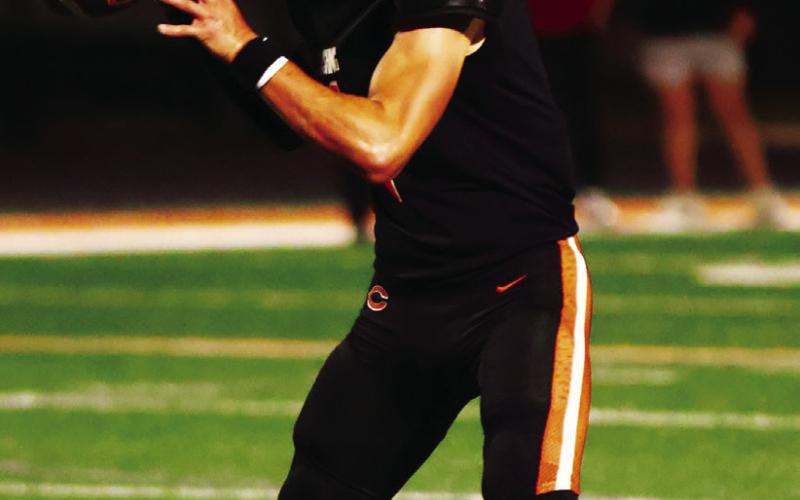 Cushing quarterback Roman Tucker completed his first 12 passes Thursday and was 23 of 27 the entire game. Photo by Sylvia Danyele