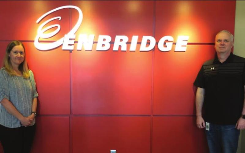 Enbridge Energy awards United Way grants in recognition of Latina Simmons (Left) and Brent Rush (right)