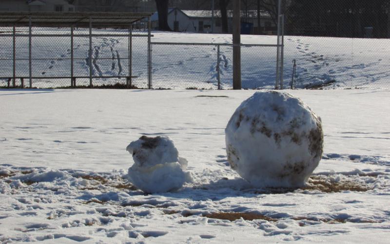 Time honored tradition of building snowmen and attempting to create the largest snowball was well displayed at Cushing Memorial Park last week before the increasing temperatures melted away the remaining snow.