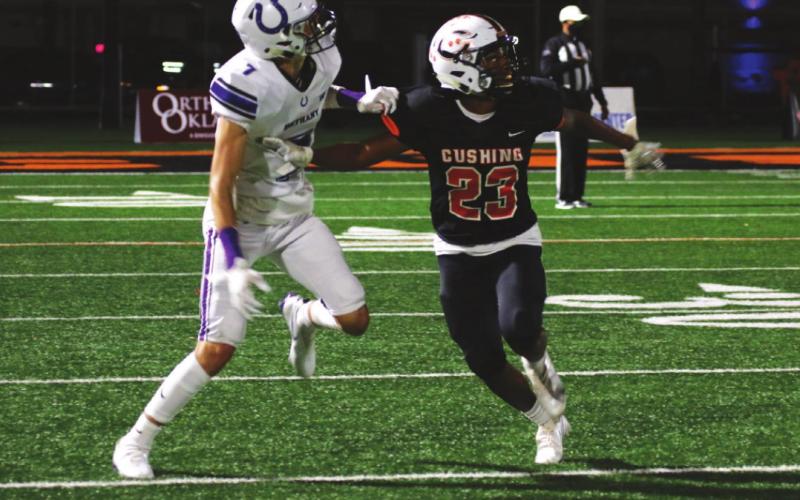 Tiger defensive back Noah Jones blankets a Broncho receiver Friday.