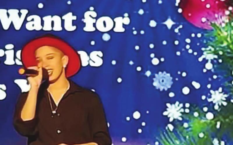 Top: Aubri Crumpton performs at Cushiung COmmunity Theater’s The Magic of Christmas.